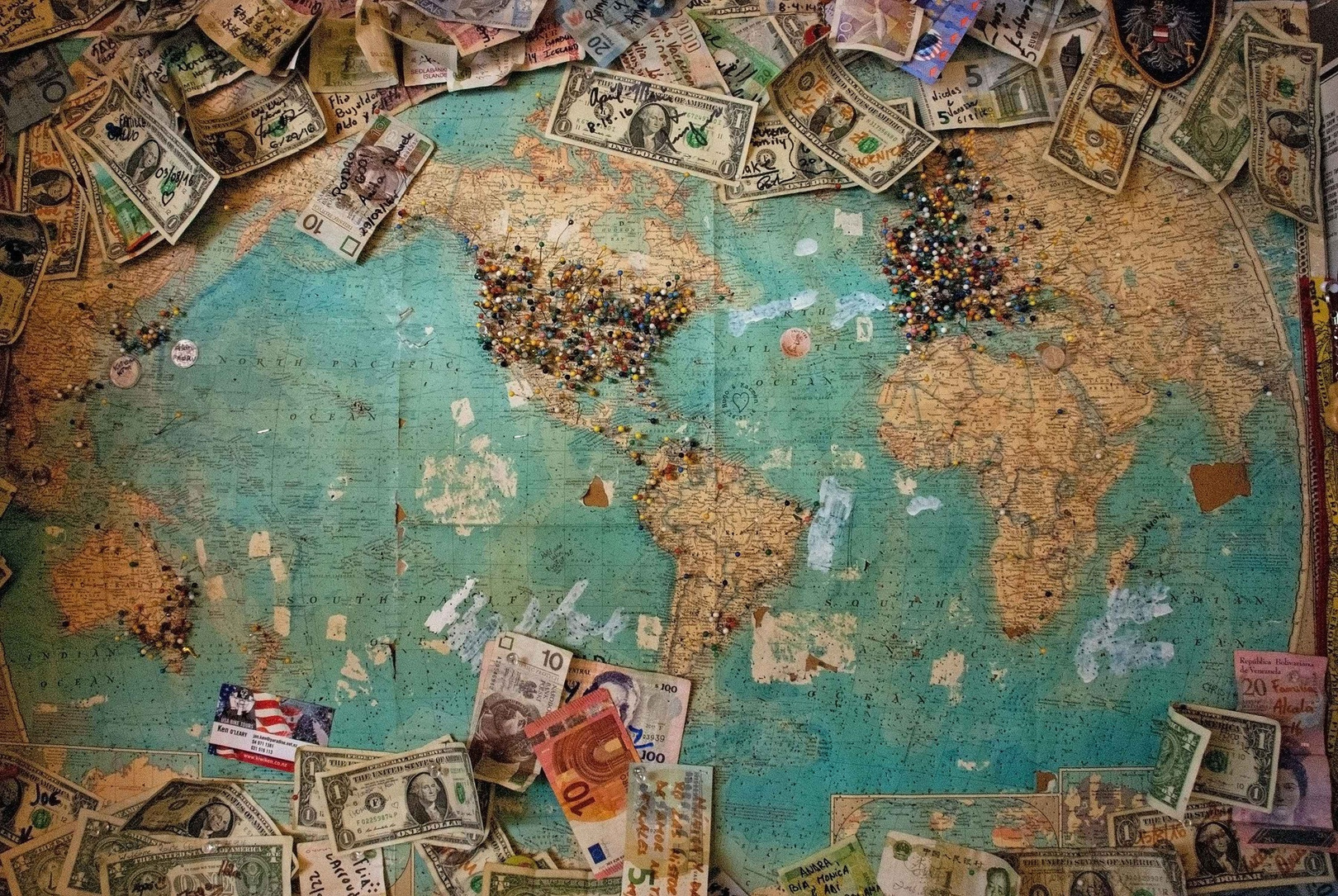 Vintage world map with global finance imagery