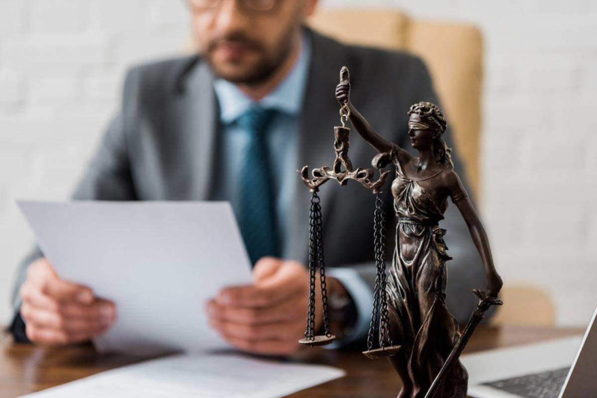 Legal professional reviewing documents